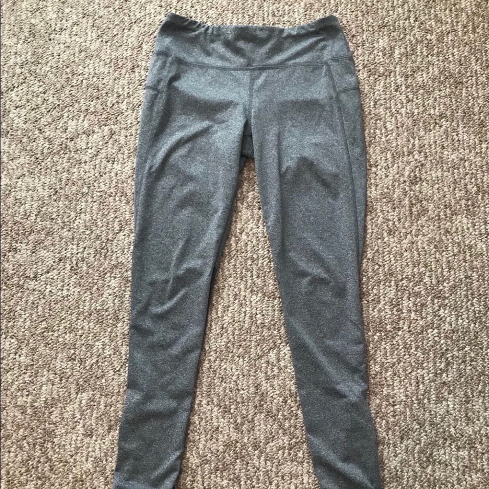 Woman’s grey athletic leggings